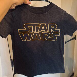 Star Wars TShirt, Dark Grayish/Black with the Yellow logo -  Size S (6-7)